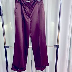Jennifer Lopez burgundy,purplish pants size 10 average with cuffs.